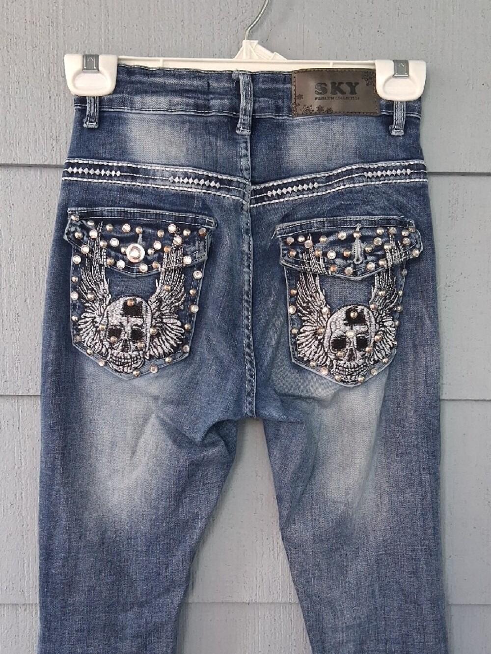 Sky Denim Jeans with Studded Winged Skull Pocket - Picture 2 of 8